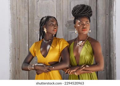 You better treat her like your queen. Shot of two beautiful women posing outside.