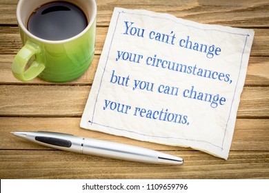 You can not change your circumstances, but  you can change your reactions - inspiraitonal handwriitng on a napkin with a cup of coffee - Shutterstock ID 1109659796