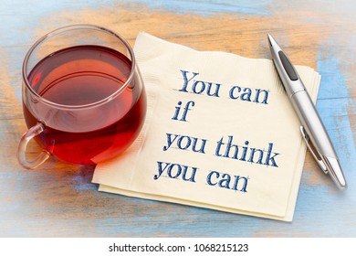 You can if think you can - inspirational handwriting on a napkin with a cup of tea - Shutterstock ID 1068215123