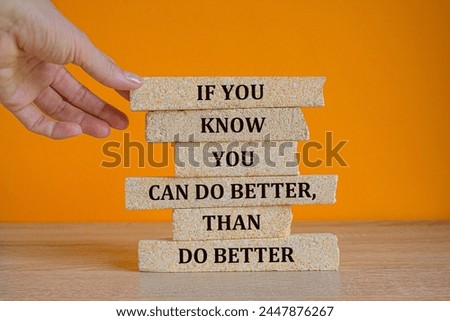 If you know you can do better, than do better. Words on the brick blocks on beautiful orange background. Businessman hand. Motivational quote. Copy space.