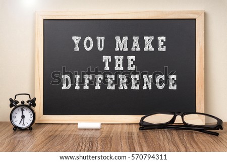 You Make The Difference word on chalkboard.