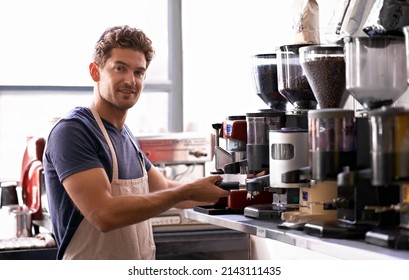 You name the blend and hell make it. Portrait of a young male barista in a coffee shop. - Powered by Shutterstock