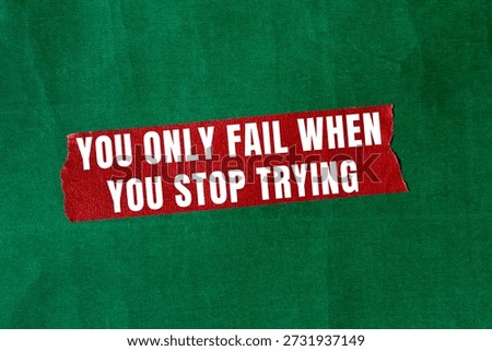 You Only Fail When You Stop Trying message written on ripped torn paper background. Conceptual You Only Fail When You Stop Trying symbol. Copy space.