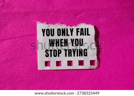 You Only Fail When You Stop Trying message written on ripped torn paper background. Conceptual You Only Fail When You Stop Trying symbol. Copy space.