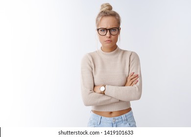 You promised took me restaurant. Portrait of upset moody girlfriend crossed hands over body sulking and frowning, being angry acting childish and jealous posing sad over white background