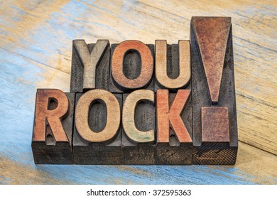 You rock compliment in vintage letterpress wood type printing blocks stained by color inks