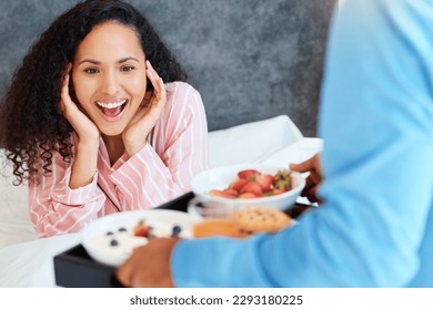 You shouldnt have. an attractive young woman getting served breakfast in bed by her unrecognizable husband.