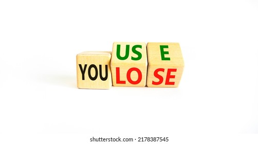 You Use Or Lose It Symbol. Concept Words You Use And You Lose On Wooden Cubes. Beautiful White Table White Background. Business And You Use Or Lose It Concept. Copy Space.