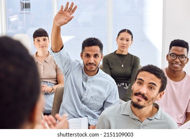 If You Want To Know More, You Have To Ask More Questions. Shot Of A Young Businessman Raising His Hand During A Presentation In An Office.