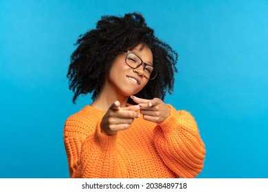 You what we need: excited african woman choosing you and gesturing point fingers front. Happy black female directing to camera, wink and bite lip. Career development, job offer and join team concept