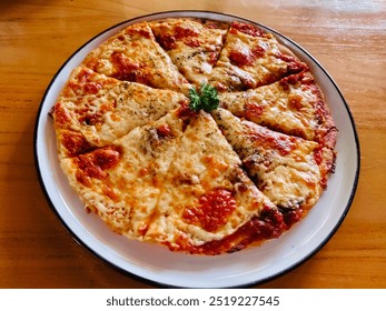 You will love this sliced simple best cheese pizzas that features a delicious chewy crust topped with gooey grated mozzarella cheese and herbs. Uses both parmesan and mozzarella and infuses olive oil. - Powered by Shutterstock