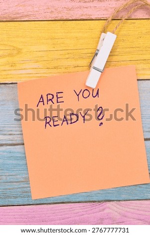 are you ready? write on card on rustical wooden background 