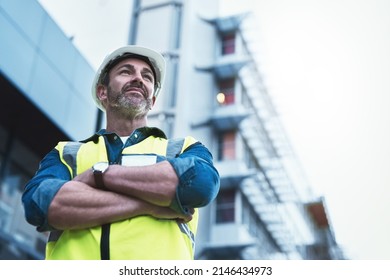 Youll Always Get A Solid Foundation With Him. Shot Of A Engineer Standing In Front Of A Building.