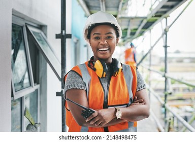 Youll want to invest in this new development. Portrait of a young woman working at a construction site. - Shutterstock ID 2148498475