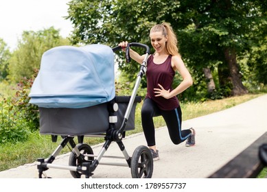 Young active mother is doing sport while walking with stroller