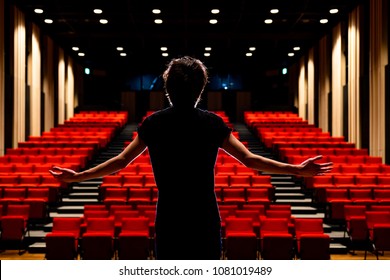 Young actor in a theater. - Shutterstock ID 1081019489