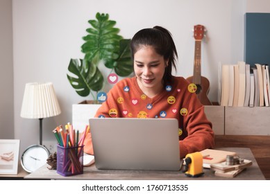 Young Adult Asian Woman Using Laptop Computer To Play Social Media Online Community And Listening Music - Relax Concept