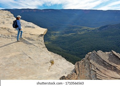 Young Adult Australian Woman Looking At The Landscape From Lincoln Rock Lookout At Sunset In The Blue Mountains National Park In New South Wales, Australia. Real People. Copy Space