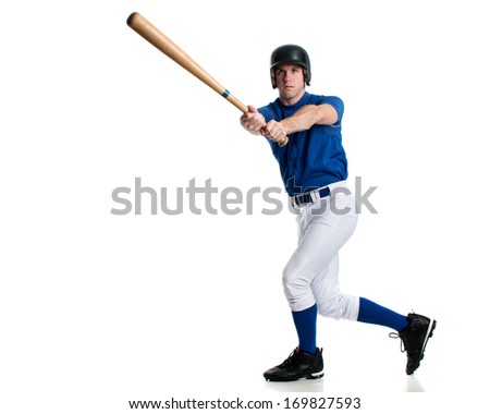 Young adult baseball player. Studio shot over white.