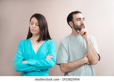 Young Adult Beautiful Couple Arguing Studio Portrait Shot, Expressing Emotions. Mixed Race, Brown Hair. Attractive People, Closeup Portrait. Studio Shot, Relationship Issues Concept