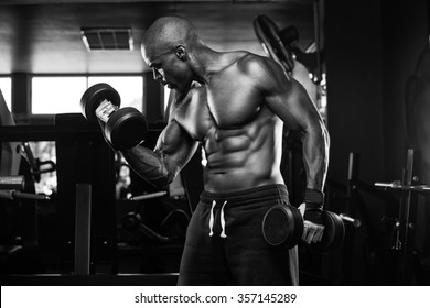 Handsome Strong Athletic Men Pumping Muscles Stock Photo 1390590884 ...