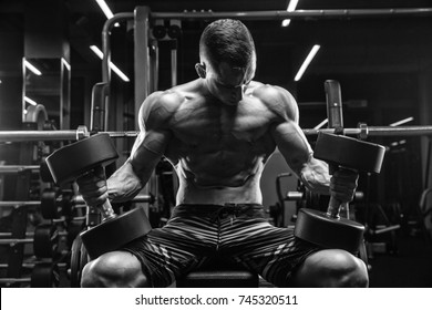 Handsome Strong Athletic Men Pumping Muscles Stock Photo 1390590884 ...