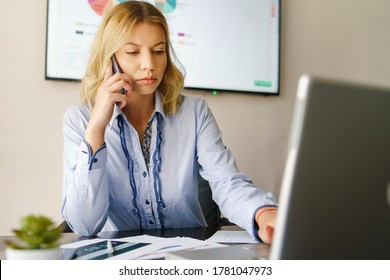 Young Adult Caucasian Woman Having A Phone Call At Work - Beautiful Girl At Work Looking Worried While Receiving Bad Tragic A News Via Phone - Female Using Phone Receiving Report At Office In Day