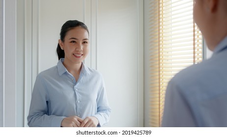 Young Adult Female Asia People Self Love Cheer Up Pep Talk Before Job Interview Deep Breathe Inhale Standing Look In Front Of Mirror Smile At Home In Mental Health Care Or Work Career Stress Relief.