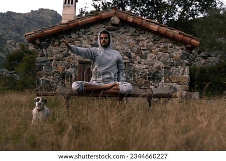 Similar – Image, Stock Photo Mountain hut in front of peak in low lying clouds
