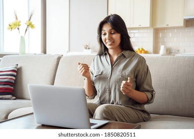 Young Adult Indian Woman Distance Teacher, Tutor, Job Applicant Talking By Video Conference Call Using Laptop Computer Work From Home Office. Virtual Chat Meeting, Web Counseling, Remote Job Interview