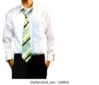 A young adult male in black pants and a white collared shirt.  The green striped tie is loosened around the neck, top button is undone. - Powered by Shutterstock