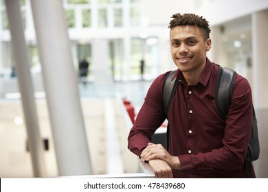 Young Adult Male Student In Modern University Lobby