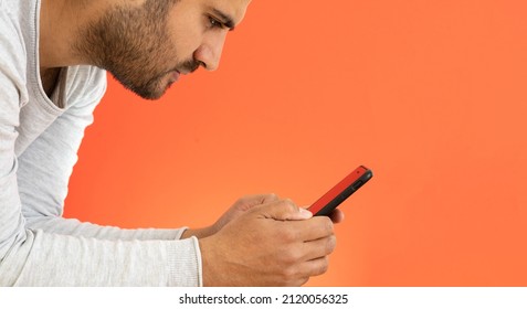 Young adult man chatting on online dating application. concept of search relationship on internet. - Shutterstock ID 2120056325