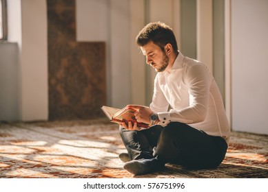 Young adult Muslim reading