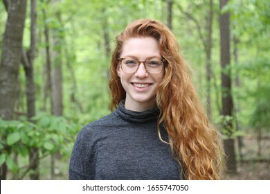 Young adult profile picture with red hair. - Shutterstock ID 1655747050