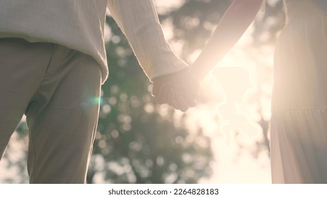 Young adult two fiance asia lover man and woman happy begin couple date life flirt sweet care touch. Asian people bride groom fall in love relax hold hand swear with trust hope on newlywed family day. - Shutterstock ID 2264828183