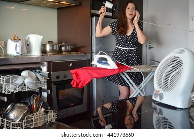 Young Adult Woman (age 25-35) Wasting Electricity Power At Home. Concept Of Electricity Consumption, Wast Of Power , High Energy Use. Real People. Copy Space