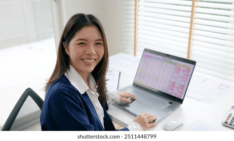 Young adult woman asia people expert tech talent user happy smile looking at camera on AI project SEO visual big data science report center BI smart tools. Office IT worker asian analyst tax audit job