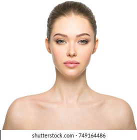 Young adult woman with beautiful face, clean healthy skin - isolated on white. Skin care concept. 