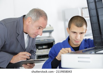 Young Adults Fixing Computer Hardware In Technology School