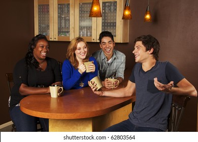 Young Adults Hanging Out In Coffee House