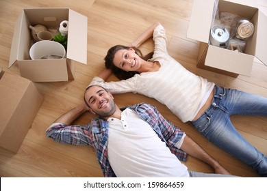Young adults moving in new home