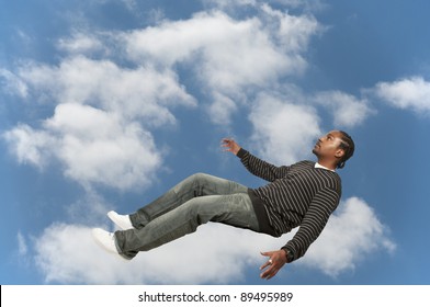 Young African American Black Man Falling Through The Sky