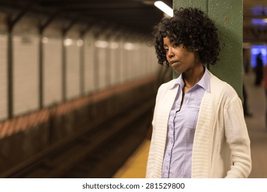 Young African American Black Woman In Subway Station Platform