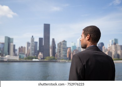 Young African American Business Man Looking At NYC Skyline, Photographed In NYC In September 2017