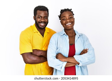 Young African American Couple Wearing Casual Clothes Happy Face Smiling With Crossed Arms Looking At The Camera. Positive Person. 