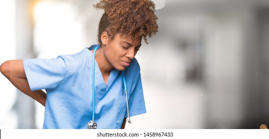 Young African American Doctor Woman Over Isolated Background Suffering Of Backache, Touching Back With Hand, Muscular Pain