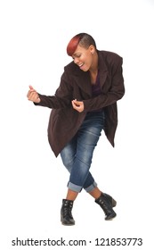 Young African American Female Dancer Snapping Her Fingers In A Dance Pose. Isolated On White Background