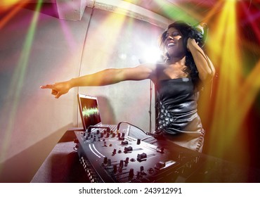 Young African American Female Dj Playing Music At A Party