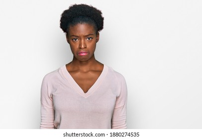 Young african american girl wearing casual clothes depressed and worry for distress, crying angry and afraid. sad expression. 